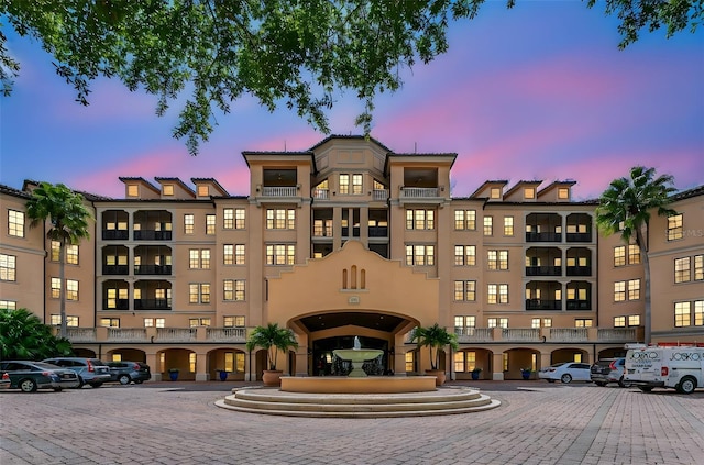 501 Mirasol Cir Unit 213, Celebration, FL 34747 - view of building exterior with uncovered parking