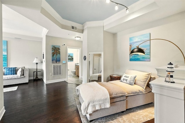 501 Mirasol Cir Unit 213, Celebration, FL 34747 - bedroom with ornamental molding, hardwood / wood-style flooring, and connected bathroom