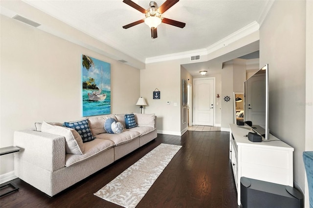 501 Mirasol Cir Unit 213, Celebration, FL 34747 - living room with ceiling fan, ornamental molding, and dark wood-type flooring