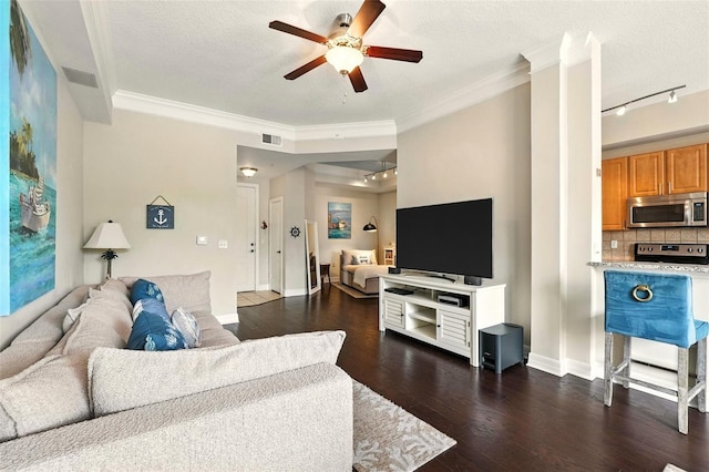 501 Mirasol Cir Unit 213, Celebration, FL 34747 - living room with a ceiling fan, dark wood-style flooring, a textured ceiling, ornamental molding, and rail lighting