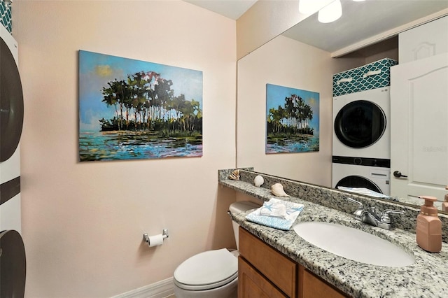 501 Mirasol Cir Unit 213, Celebration, FL 34747 - bathroom with stacked washer / dryer and vanity