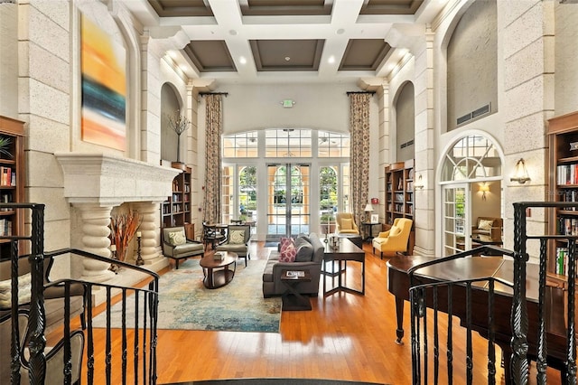 501 Mirasol Cir Unit 213, Celebration, FL 34747 - building lobby featuring a towering ceiling, coffered ceiling, and beamed ceiling