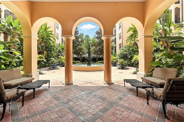 501 Mirasol Cir Unit 213, Celebration, FL 34747 - view of patio / terrace featuring a swimming pool