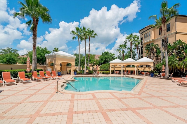 501 Mirasol Cir Unit 213, Celebration, FL 34747 - community pool with a patio area