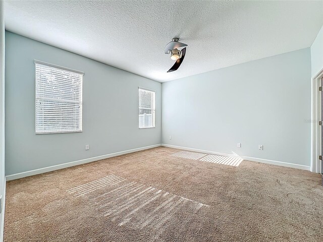 15150 Evergreen Oak Loop, Winter Garden, FL 34787 - unfurnished room with carpet floors and a textured ceiling