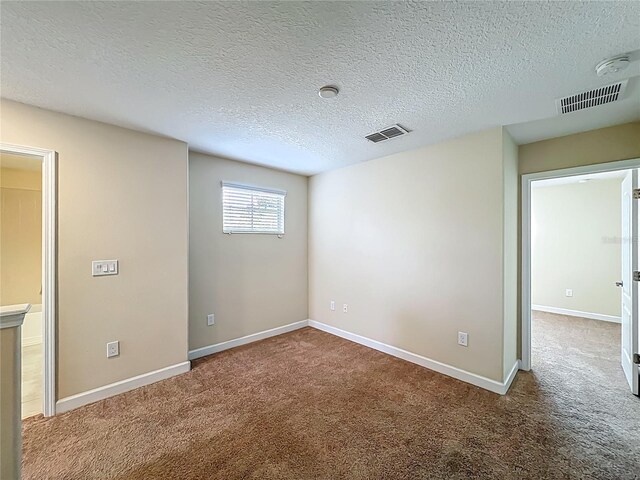 15150 Evergreen Oak Loop, Winter Garden, FL 34787 - unfurnished room with carpet floors, a textured ceiling, and a smoke detector