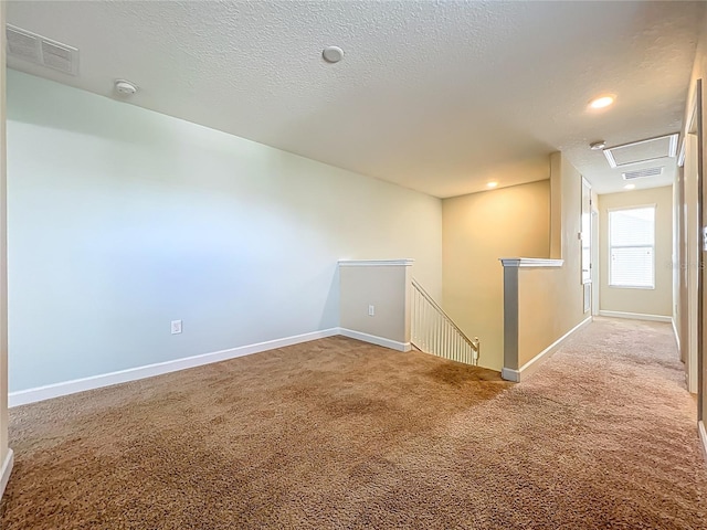 15150 Evergreen Oak Loop, Winter Garden, FL 34787 - carpeted spare room with a smoke detector, recessed lighting, and a textured ceiling