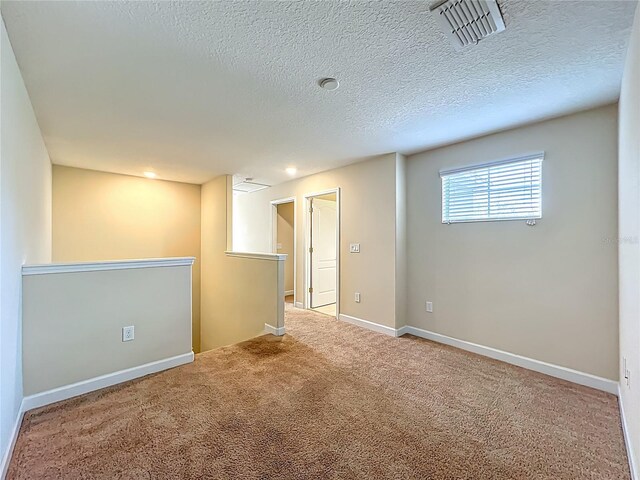 15150 Evergreen Oak Loop, Winter Garden, FL 34787 - carpeted empty room with a textured ceiling and baseboards