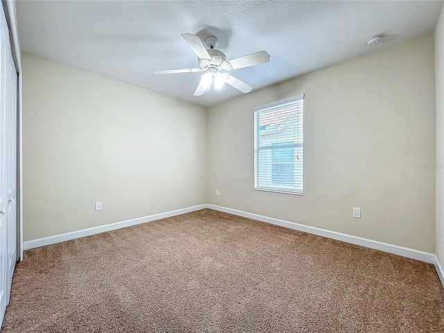 15150 Evergreen Oak Loop, Winter Garden, FL 34787 - carpeted empty room featuring a smoke detector, ceiling fan, and a textured ceiling