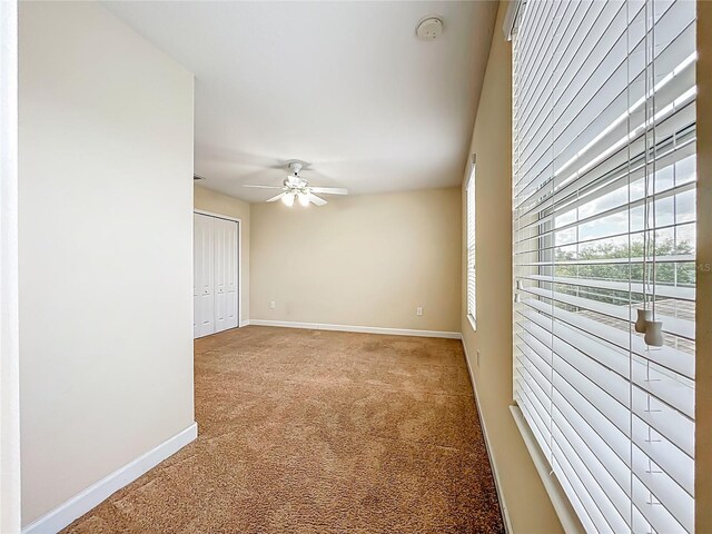 15150 Evergreen Oak Loop, Winter Garden, FL 34787 - spare room with light colored carpet, a ceiling fan, and a smoke detector