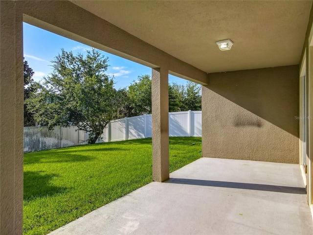 15150 Evergreen Oak Loop, Winter Garden, FL 34787 - fenced backyard featuring a patio