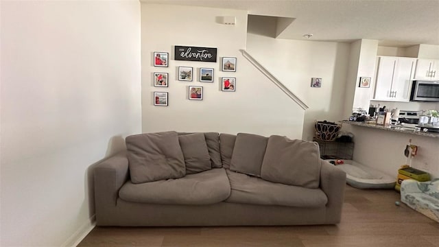 1528 Mirabella Cir, Davenport, FL 33897 - living area with wood finished floors