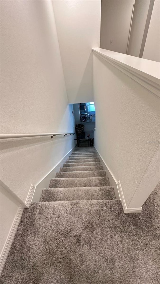 1528 Mirabella Cir, Davenport, FL 33897 - stairs with carpet flooring and a textured wall