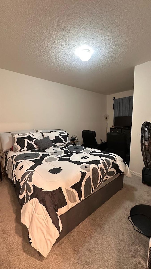 1528 Mirabella Cir, Davenport, FL 33897 - carpeted bedroom featuring a textured ceiling