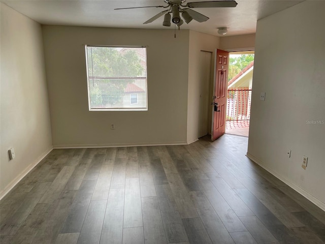 3016 Parkway Blvd Unit 303, Kissimmee, FL 34747 - empty room with ceiling fan and wood finished floors