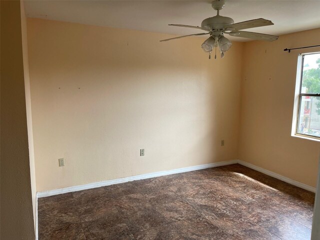 3016 Parkway Blvd Unit 303, Kissimmee, FL 34747 - unfurnished room with ceiling fan and baseboards