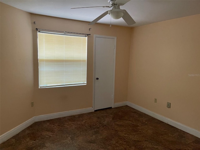 3016 Parkway Blvd Unit 303, Kissimmee, FL 34747 - empty room with a ceiling fan and baseboards