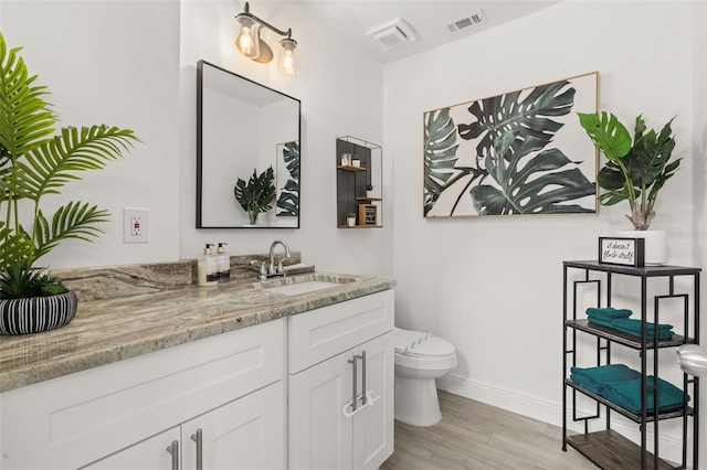 2313 Duncan Trl, Clermont, FL 34714 - bathroom featuring vanity and wood finished floors