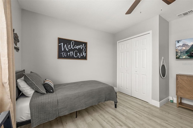 2313 Duncan Trl, Clermont, FL 34714 - bedroom featuring wood finished floors, a closet, and ceiling fan