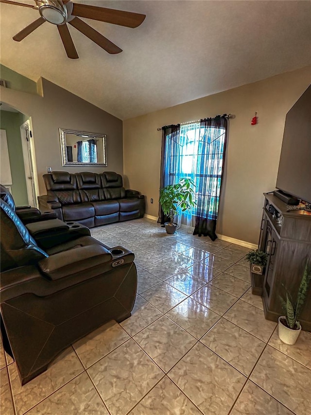 2333 Ainsworth Ave, Deltona, FL 32738 - living area featuring lofted ceiling, ceiling fan, and arched walkways