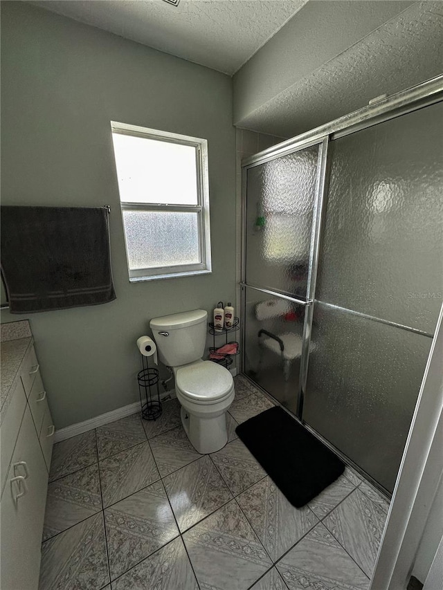 2333 Ainsworth Ave, Deltona, FL 32738 - bathroom with a stall shower, vanity, and a textured ceiling