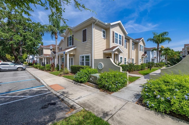 5372 Diplomat Ct Unit 108, Kissimmee, FL 34746 - view of side of home with a residential view and uncovered parking