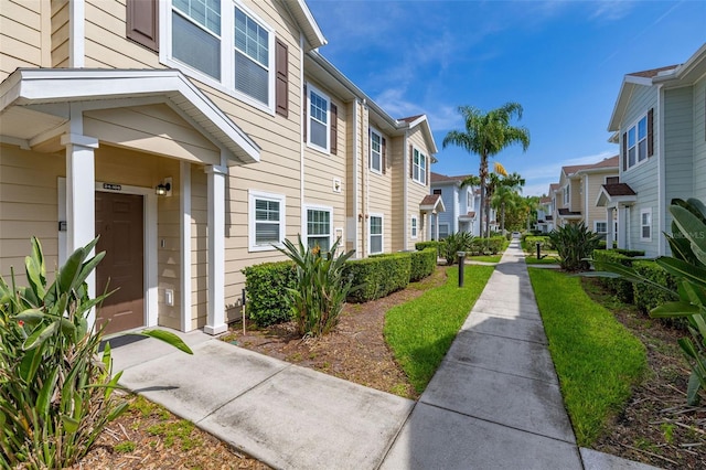 5372 Diplomat Ct Unit 108, Kissimmee, FL 34746 - view of home's community featuring a residential view and a garage
