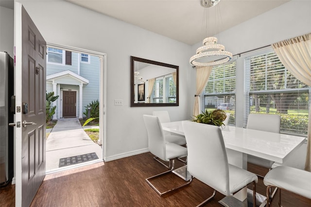 5372 Diplomat Ct Unit 108, Kissimmee, FL 34746 - dining space featuring wood finished floors and baseboards