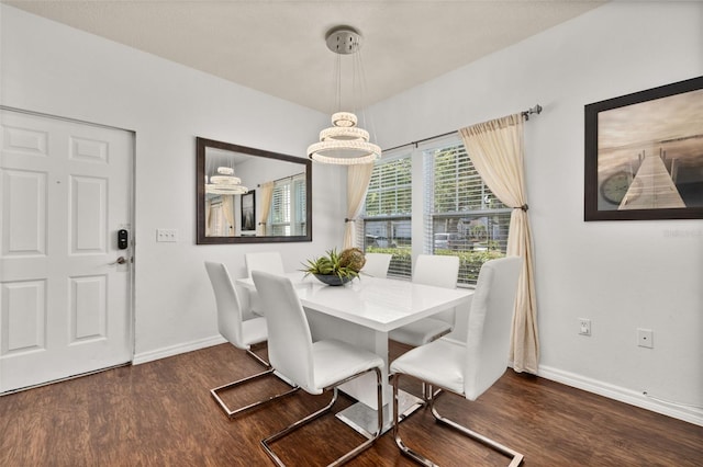 5372 Diplomat Ct Unit 108, Kissimmee, FL 34746 - dining area featuring wood finished floors and baseboards