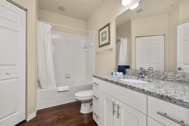 5372 Diplomat Ct Unit 108, Kissimmee, FL 34746 - bathroom featuring vanity, wood finished floors, and shower / bathtub combination with curtain