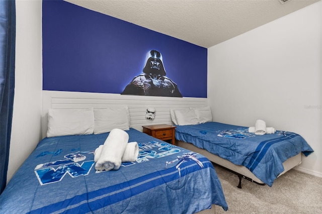 5372 Diplomat Ct Unit 108, Kissimmee, FL 34746 - carpeted bedroom with a textured ceiling