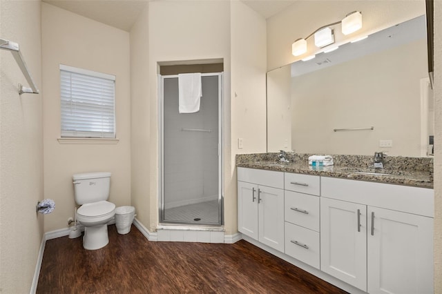 5372 Diplomat Ct Unit 108, Kissimmee, FL 34746 - full bath featuring a stall shower, wood finished floors, and double vanity