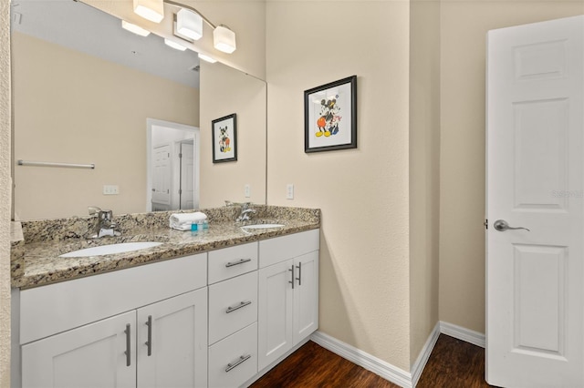 5372 Diplomat Ct Unit 108, Kissimmee, FL 34746 - full bath featuring wood finished floors and double vanity