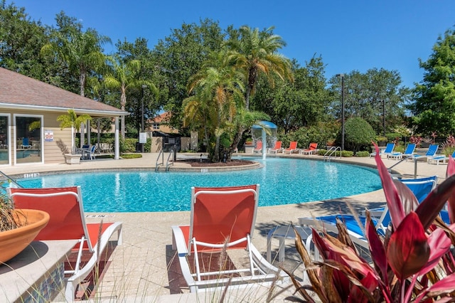 5372 Diplomat Ct Unit 108, Kissimmee, FL 34746 - community pool with a patio