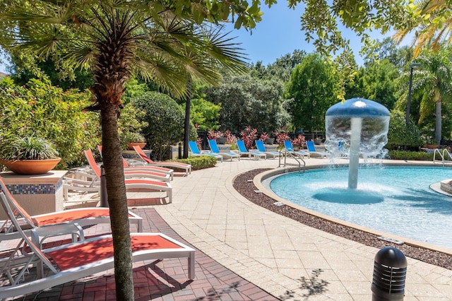 5372 Diplomat Ct Unit 108, Kissimmee, FL 34746 - community pool featuring a patio