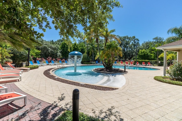 5372 Diplomat Ct Unit 108, Kissimmee, FL 34746 - community pool featuring a patio