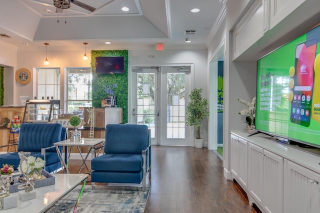 5372 Diplomat Ct Unit 108, Kissimmee, FL 34746 - living area featuring ceiling fan, dark wood-type flooring, ornamental molding, recessed lighting, and a tray ceiling