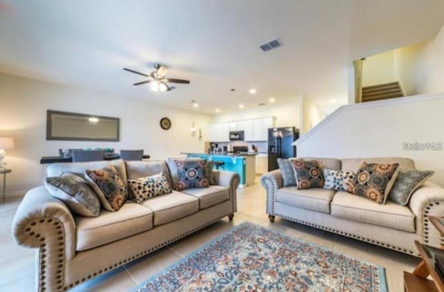4710 Terrasonesta Dr, Davenport, FL 33837 - living room with ceiling fan, light tile patterned floors, and recessed lighting
