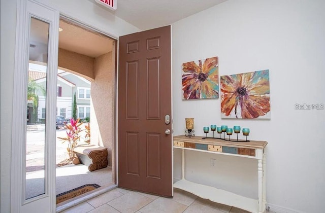 4710 Terrasonesta Dr, Davenport, FL 33837 - entrance foyer with light tile patterned floors and arched walkways