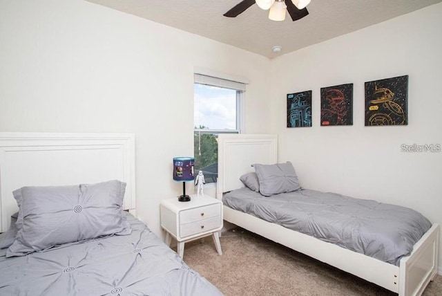 4710 Terrasonesta Dr, Davenport, FL 33837 - bedroom featuring carpet floors and ceiling fan