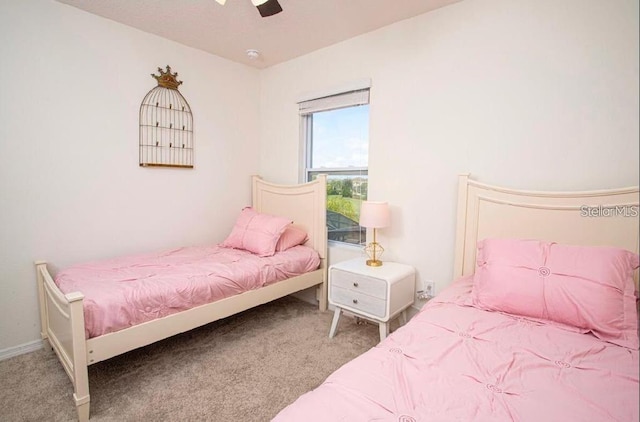 4710 Terrasonesta Dr, Davenport, FL 33837 - bedroom with carpet floors and ceiling fan