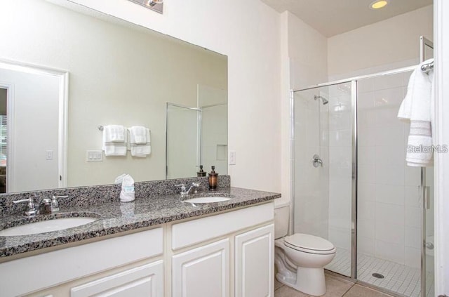 4710 Terrasonesta Dr, Davenport, FL 33837 - bathroom featuring a shower stall, double vanity, and tile patterned floors