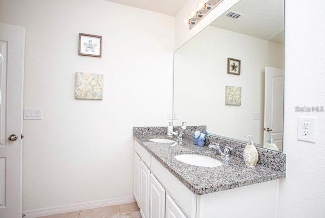 4710 Terrasonesta Dr, Davenport, FL 33837 - bathroom featuring double vanity and tile patterned flooring