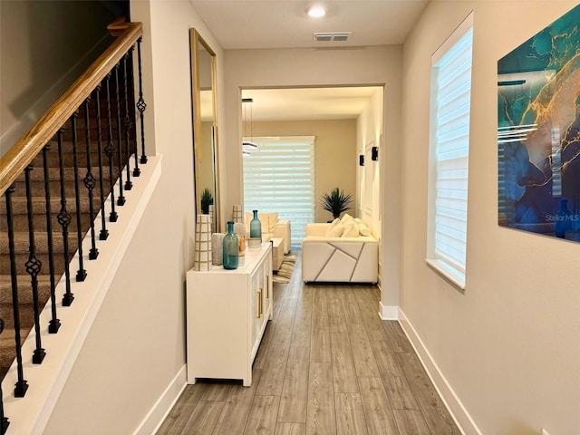 1399 Greenfield Loop, Kissimmee, FL 34747 - hall with wood finished floors and stairs