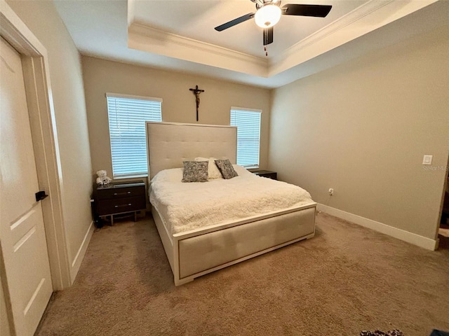 1399 Greenfield Loop, Kissimmee, FL 34747 - carpeted bedroom featuring crown molding, a raised ceiling, and a ceiling fan