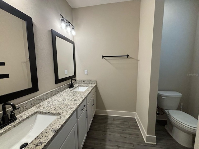 1399 Greenfield Loop, Kissimmee, FL 34747 - bathroom featuring wood finished floors and double vanity