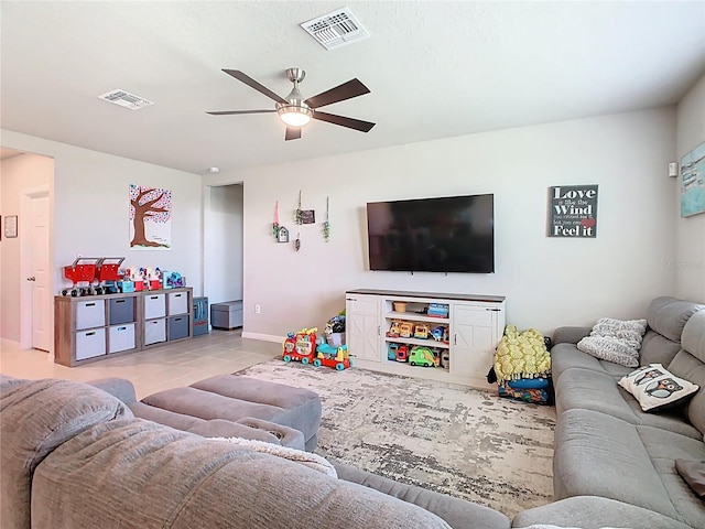 509 Mckenna Dr, Winter Haven, FL 33881 - living room featuring ceiling fan and baseboards