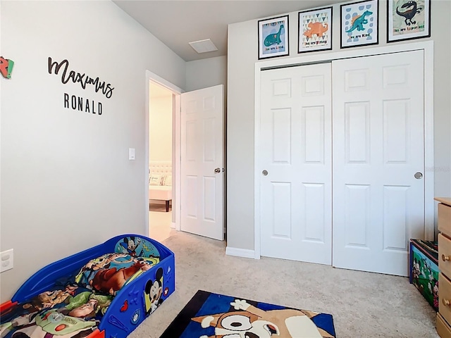 509 Mckenna Dr, Winter Haven, FL 33881 - bedroom featuring a closet and light colored carpet