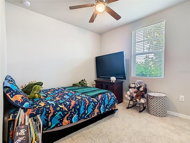 509 Mckenna Dr, Winter Haven, FL 33881 - bedroom with carpet floors and ceiling fan