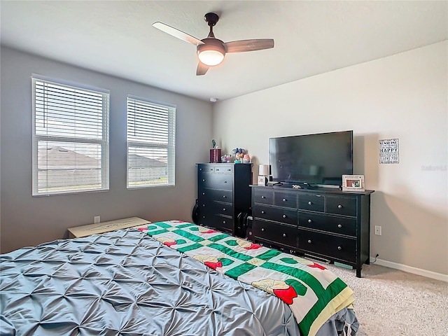 509 Mckenna Dr, Winter Haven, FL 33881 - carpeted bedroom with a ceiling fan and baseboards